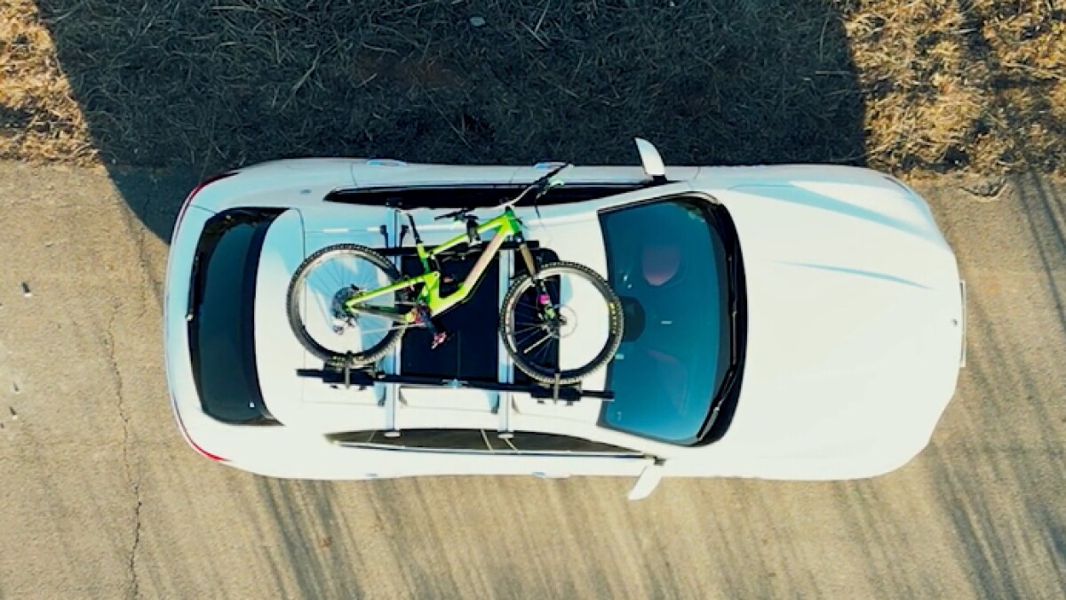 How to strap a bike to a roof rack hotsell